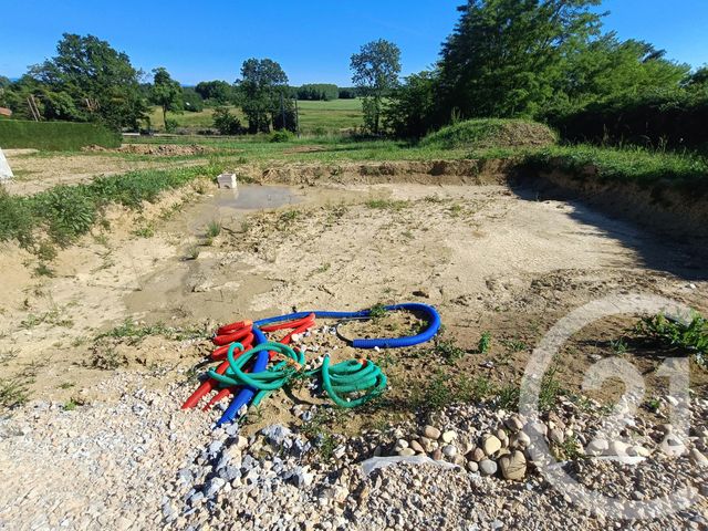 Afficher la photo en grand terrain à vendre - 1695.0 m2 - POLLIAT - 01 - RHONE-ALPES - Century 21 Camaz Immobilier